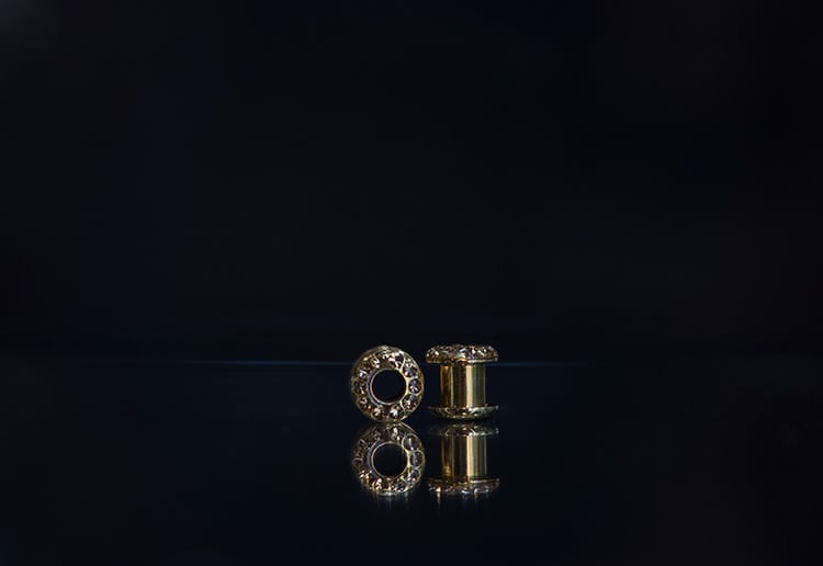 Dilatación acero dorado rosca con joyeria
