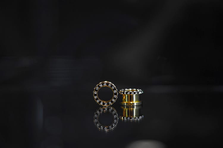 Dilatación acero dorado rosca y joyería