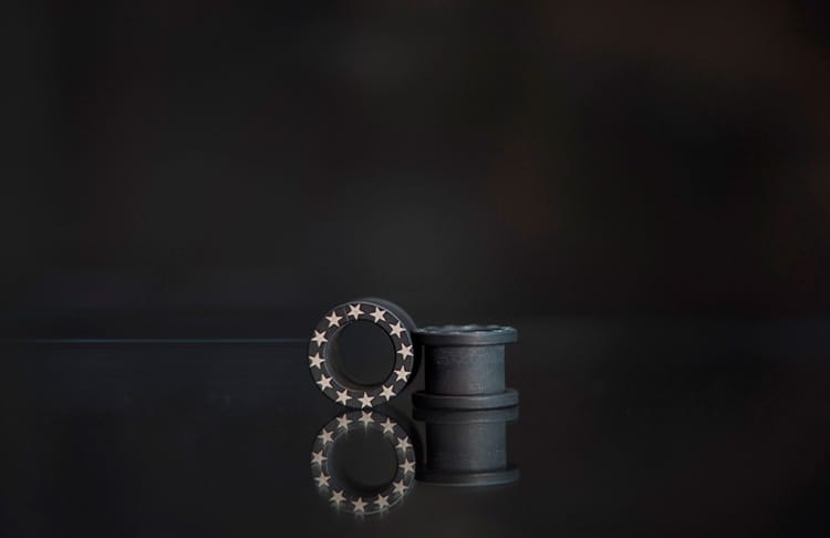 Dilatación acero negro mate y estrellas