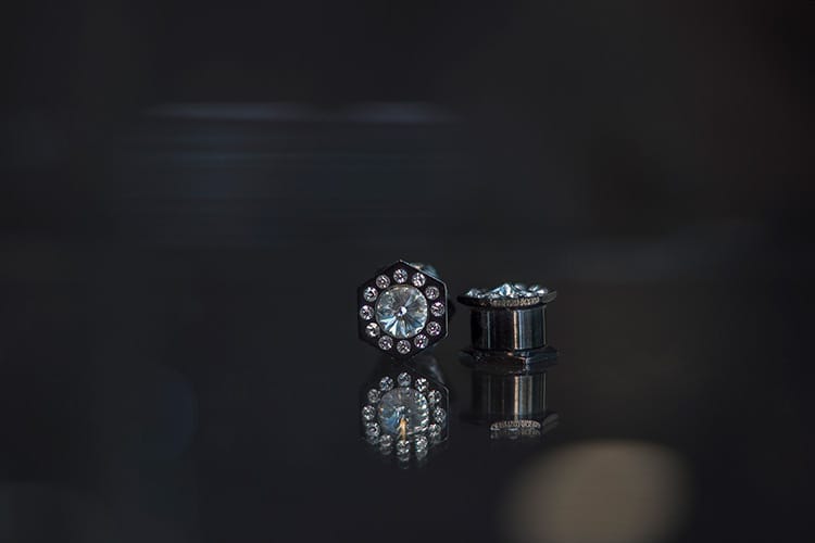 Dilatación exagonal acero negro con joyas