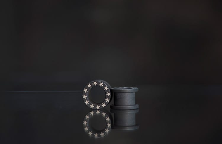 Dilatación túnel acero negro mate con estrellas