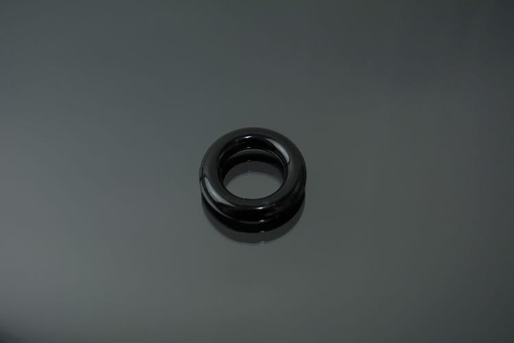 Dilatador acero curvo negro, circular, a presión