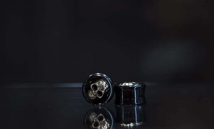 Dilatador acrílico calavera metal