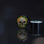 Dilatador acrílico con rosca calavera musical