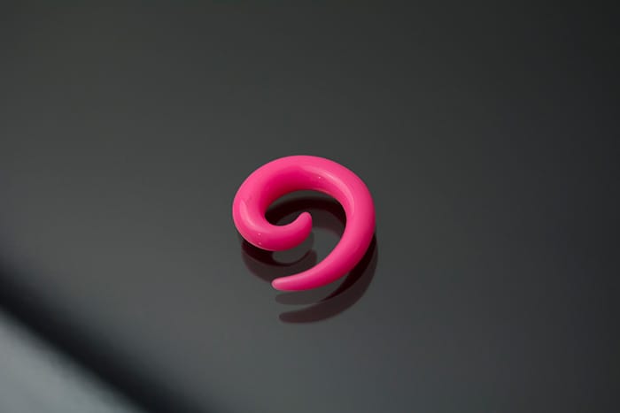 Espiral acrílico rosa liso