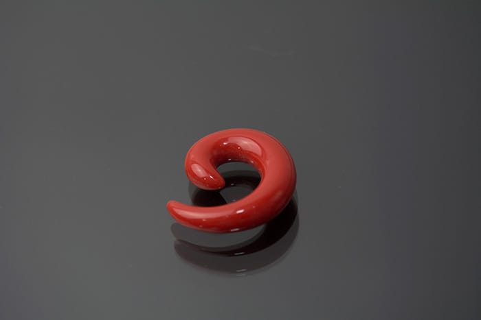Espiral rojo liso