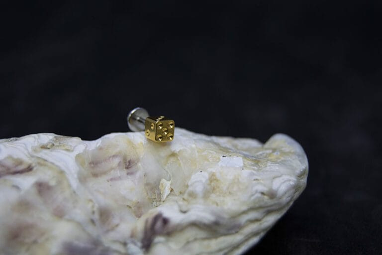 Falsa dilatación acero 12 mm dado dorado