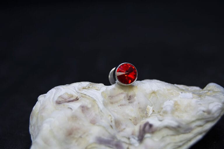 Falsa dilatación acero 12 mm joya roja