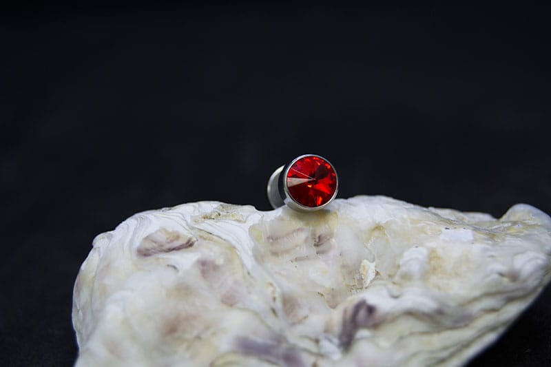 Falsa dilatación acero 12 mm joya roja