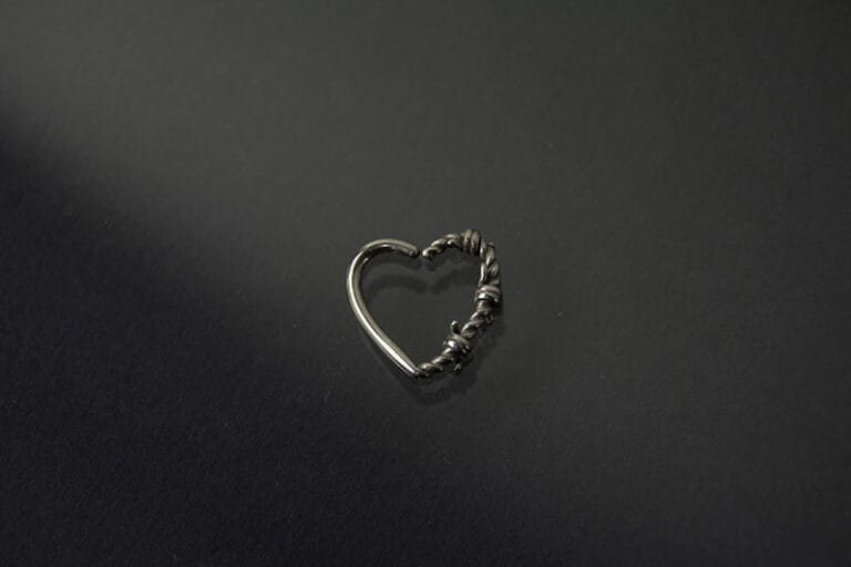 Joyera acero corazón abrefacil mitad trenzado