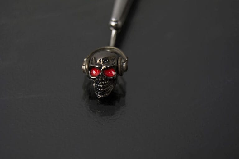 Navel acero calavera audífonos