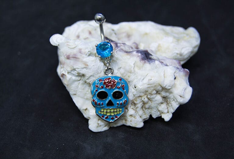 Navel acero calavera mexicana joyería azul