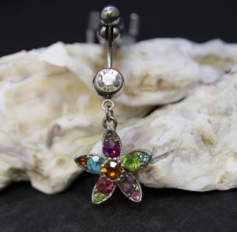 Navel acero cruz flor colores joya