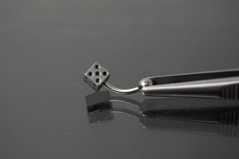 Navel acero dado
