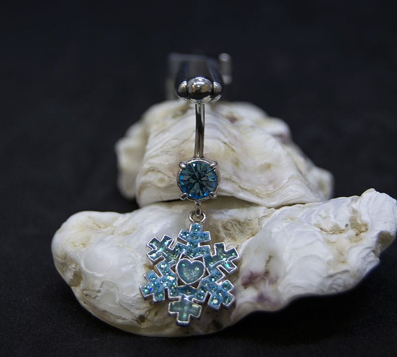 Navel acero formas azul joya