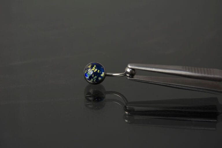 Navel acero joya colores