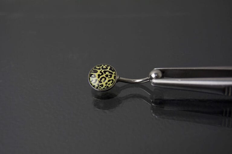 Navel acero joya leopardo