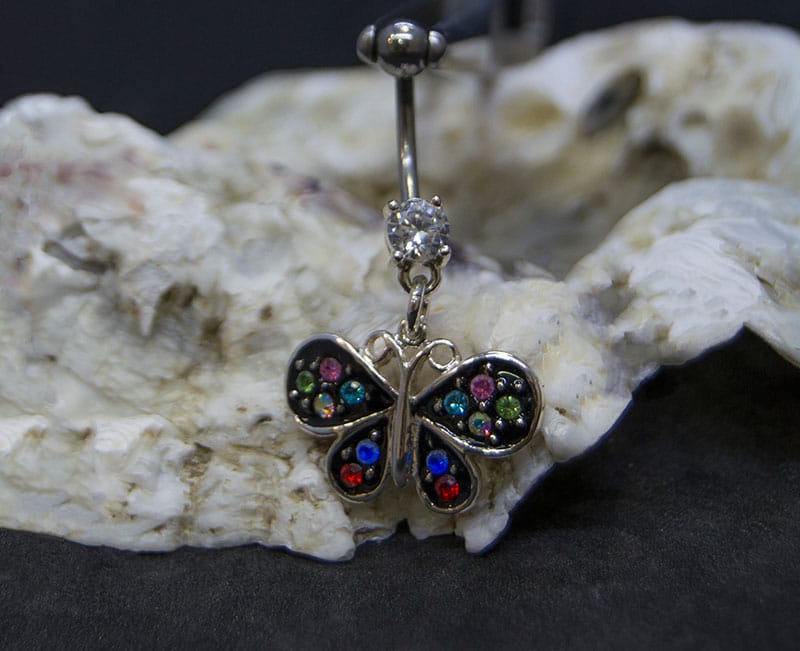 Navel acero mariposas joyas base negra