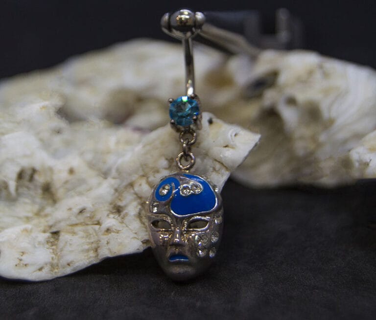 Navel acero veneciana joya azul