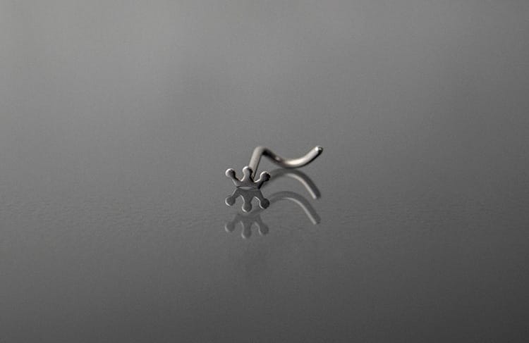 Piercing acero corona